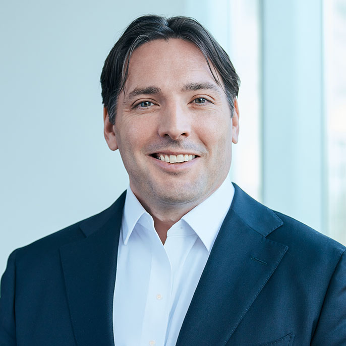 Professional headshot of Garrett Leigh, Director at Essex Three-Twelve.
